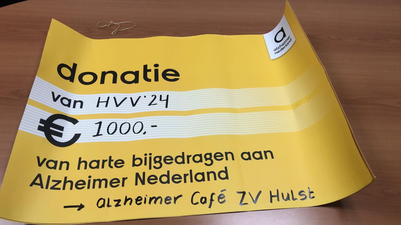 Gift aan Alzheimer café Hulst